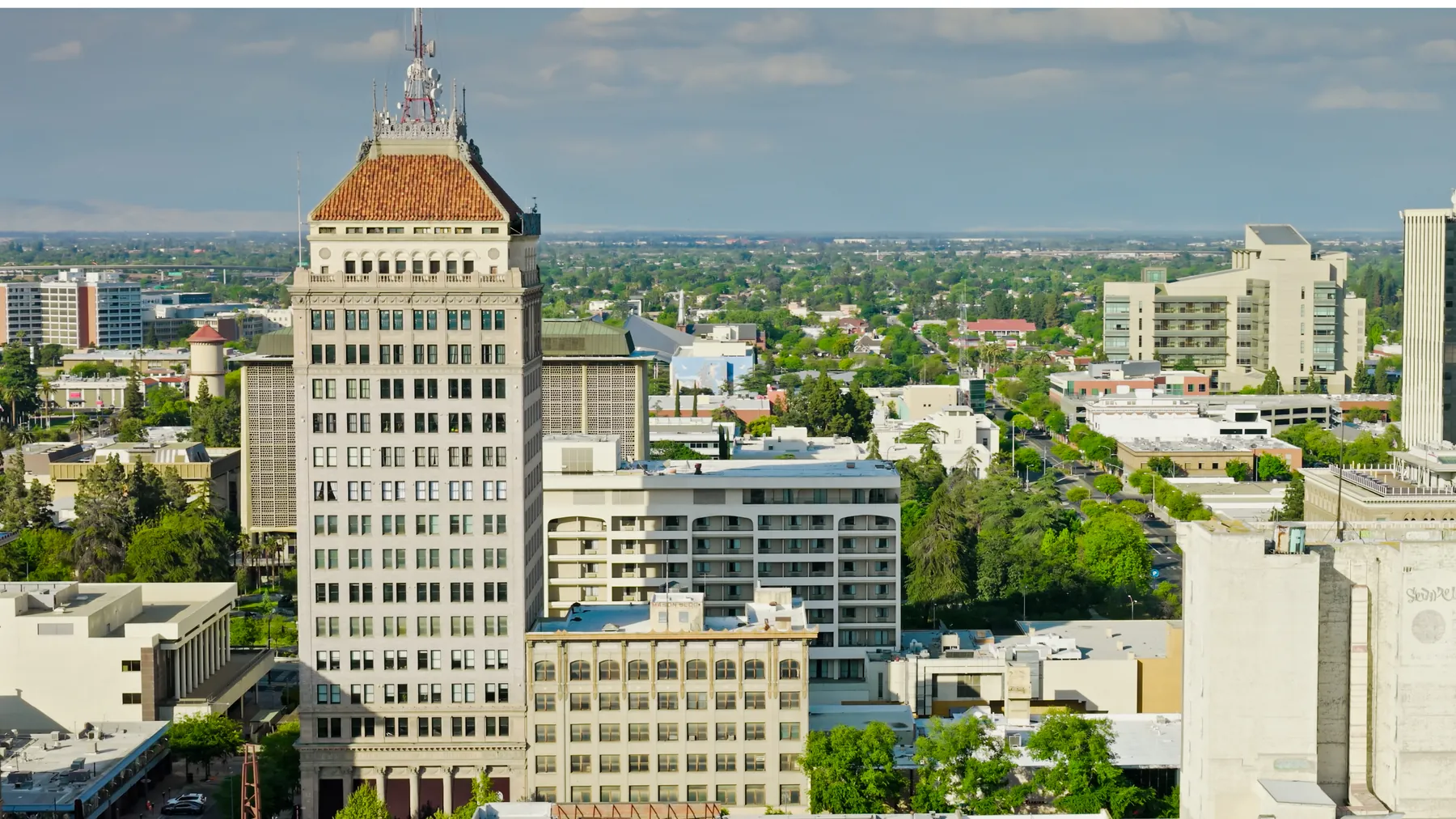 Downtown Fresno, the Pacific Southwest Building and tree-lined neighborhoods seen from above